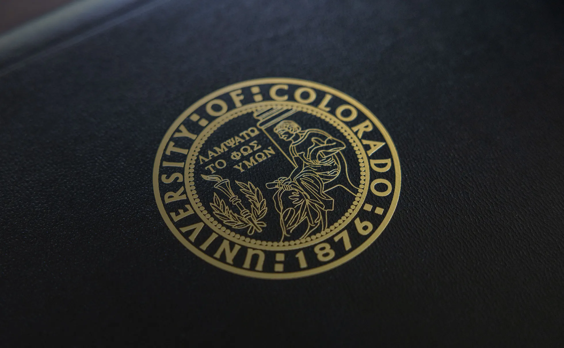 CU Seal on a diploma jacket