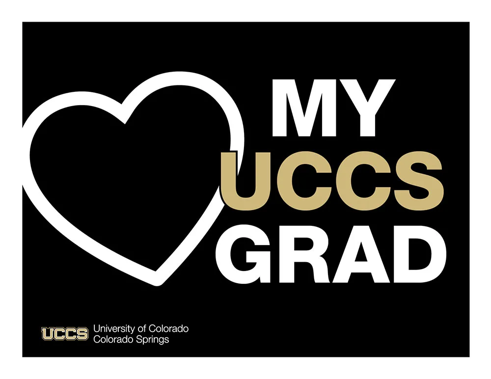 Sign with a heart that reads love my UCCS grad
