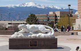a marble mountain lion statue